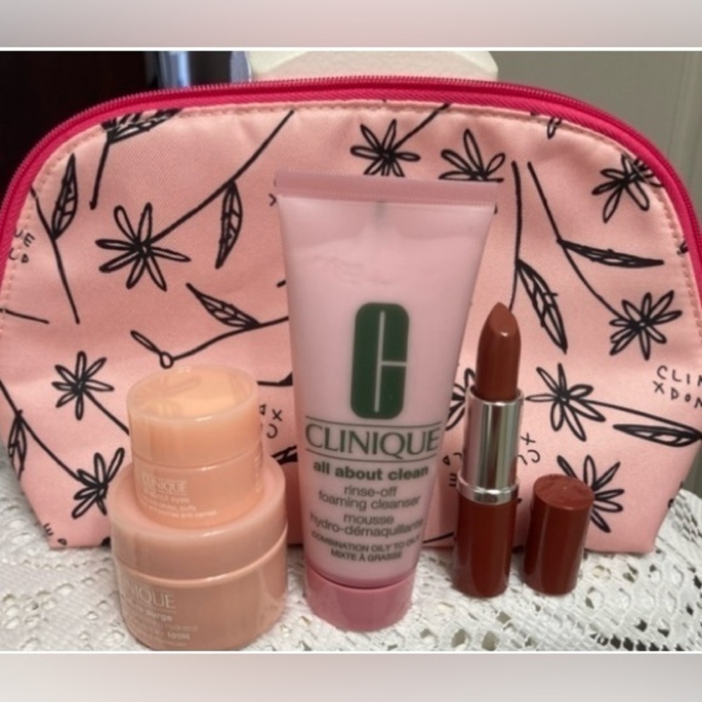 NWT 5 Pc. Set ~ Moisture Surge, All About Eyes, Cleanser, Lipstick & Bag